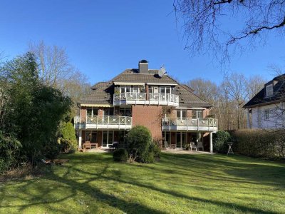 Exklusive 4-Zimmer-Wohnung mit Terrasse, EBK und exklusiver Gartennutzung.