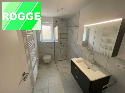 Hochwertige 3 -Zimmerwohnung mit Garage ,direkter Zugang zum Gartenanteil und Balkon