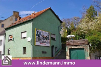 Heiligenwald: Voll vermietetes Dreifamilienhaus als Kapitalanlage