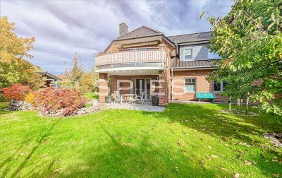 Moderne 3-Zimmer- Wohnung mit Garten und großem Carport