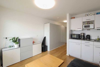 Helles 1-Zimmer-Apartment mit Balkon in moderner Wohnanlage.