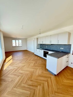Erstbezug - Neubau! Exklusive 5-Zimmer-Wohnung mit Einbauküche und großer Terrasse