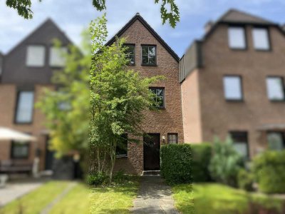 Raumwunder: helles Reihenmittelhaus mit Sonnengarten und Garage