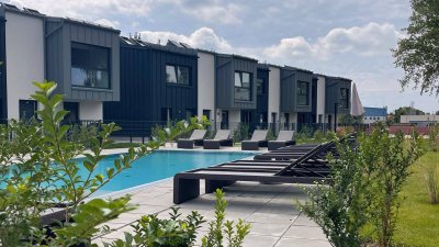 Design Apartment mit großem Outdoor-Pool und einer Spa &amp; Wellnesslandschaft