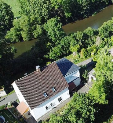 Freistehendes Haus mit Wintergarten und Garage, auch als Zweifamilienhaus nutzbar!