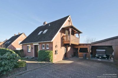 Einfamilienhaus mit Garage und großem Grundstück in ruhiger Siedlungslage in Aschenstedt