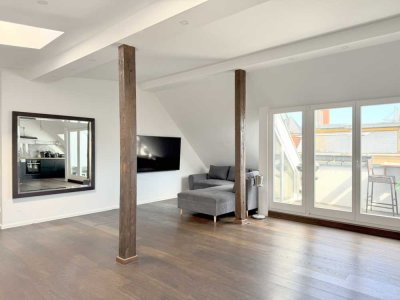 Exklusive Dachgeschosswohnung mit zwei Balkonen in zentraler Lage