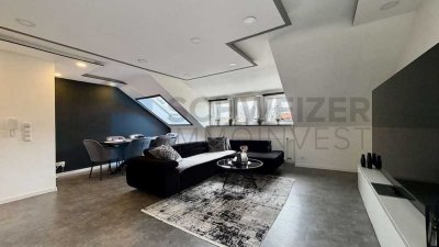 Modernisierte 2,5-Zimmer-Wohnung mit Balkon, Garage und Vermietung – attraktive Kapitalanlage