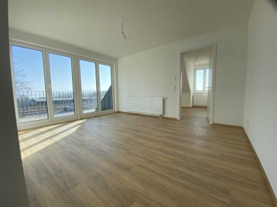 Moderne Dachgeschosswohnung (ohne Aufzug) mit See- und Bergsicht, zentral nähe Lindaupark