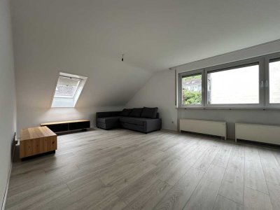 Vermietete 3-Zimmer-Dachgeschosswohnung mit Balkon in Sinzheim - Solide Kapitalanlage mit Potenzial!