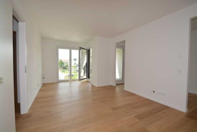 Neubau 1,5-Zimmer-Wohnung mit gehobener Innenausstattung mit Balkon und EBK in Taufkirchen