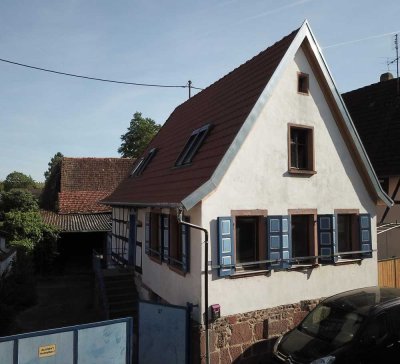 Vielseitiges Stadtdorf-Grundstück mit Projektpotenzial in ruhiger Lage von Landau-Wollmesheim