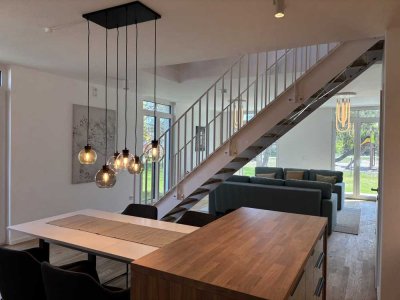 Wohnen für NKM 12,95 €/ m² inkl. Garten und Stellplätzen