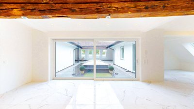 Urbaner Rückzugsort mit architektonischer Raffinesse – exklusives Penthouse am Kardinalplatz