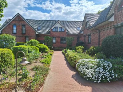 Schöne 2 Zimmer Wohnung mit Terrasse auf tollem Grundstück
