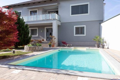 Top-Einfamilienhaus mit Pool und Wellness sowie 2 weiteren Wohnobjekten samt Lagerhalle in A-2100 Stetten bei Korneuburg