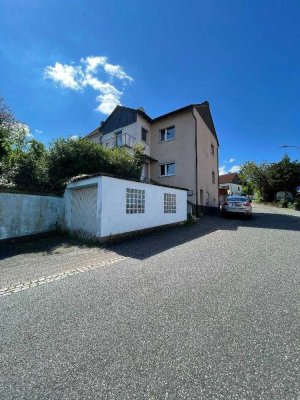 Gemütliches Einfamilienhaus mit Garten und Garage