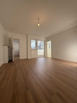 Frisch renovierte  Wohnung mit Balkon und Tiefgaragenparkplatz