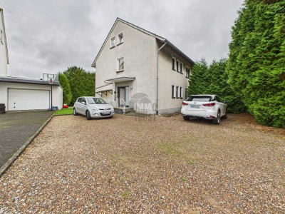 Großzügiges Mehrfamilienhaus mit Garten in ruhiger Lage