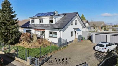 Modernisiertes, effizientes Zweifamilienhaus in ruhiger Lage mit großzügigem Garten und Doppelgarage
