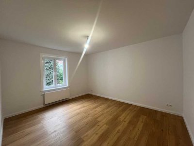 Erdgeschosswohnung mit eigenem Garten
