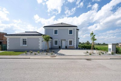 ** Eleganz und Komfort: Stilvolle und energieeffiziente Residenz mit Seezugang und Doppelgarage **