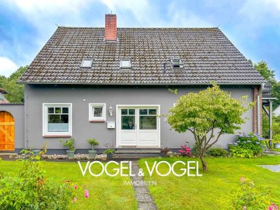Garlstedt - Modernisierte Wohnung mit Balkon, Gartenanteil und zwei Stellplätzen in ruhiger Lage