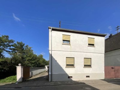 Freistehendes Einfamilienhaus mit Garage, Terrasse und Garten in Maxdorf