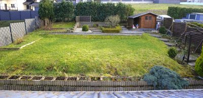 Familienfreundliches EFH mit barrierefreier Einliegerwohnung, 2 Garagen und großem Garten