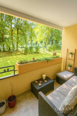 Gepflegte 3 Zimmer-Hochparterre-Wohnung mit Balkon und Tiefgaragenstellplatz