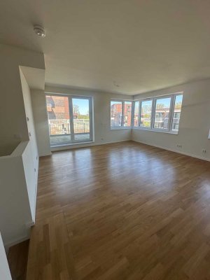 Wohnen auf 2 Etagen mit Dachterrasse und Blick aufs Wasser  - Einzigartige Maisonettewohnung