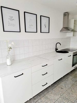 Gehobene 1 Zimmer Wohnung inkl. Einbauküche und optional 2 Tiefgaragenstellplätze