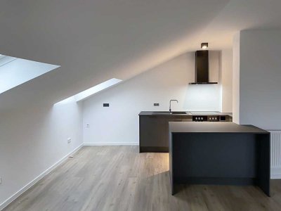 3-Zimmer-Dachgeschosswohnung mit großem Wohn-, Essbereich, inkl. EBK in Lollar-Odenhausen