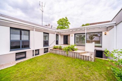 Modernes Atrium-Reiheneckhaus in Ottobrunn – versehen mit nachhaltiger Technik und hochwertiger Auss