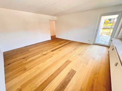 Provisionsfrei: Renovierte 4 Zimmer Gartenwohnung in Burgthann mit Balkon und Garage
