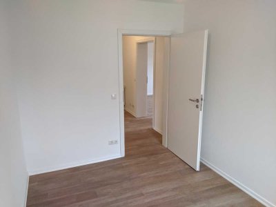 Stadtmitte Olpe: moderne 2,5-Zimmer-Wohnung mit EBK + Stellplatz + Terrasse