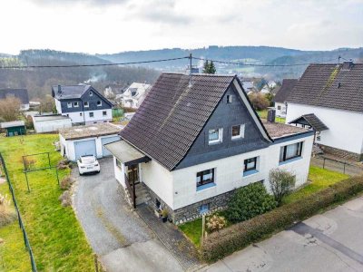 Charmantes Einfamilienhaus mit Baugrundstück und Einliegerwohnung in Oberwiehl