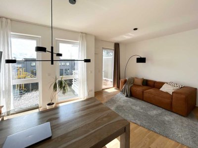 Moderne 3-Zi.-Wohnung mit zwei Balkonen in direkter Wasserlage