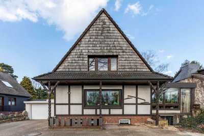 Ein großzügiges Einfamilienhaus mit zusätzlicher Einliegerwohnung im Anbau und einem herrlichen Gart