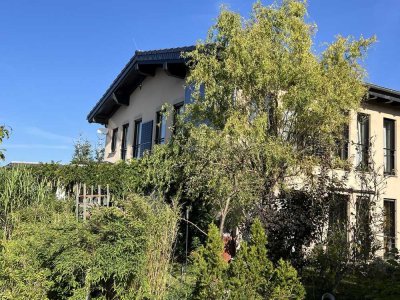 Einfamilienhaus zwischen Seen und Sonnenuntergang