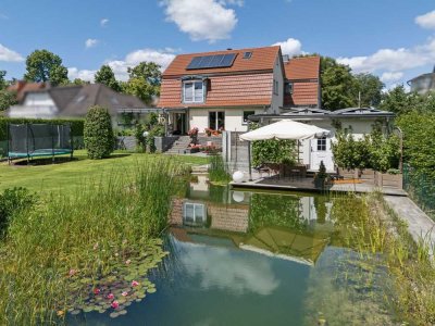 Gepflegtes Zweifamilienhaus mit hochwertiger Ausstattung und parkähnlichem Grundstück