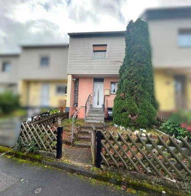 Reihenmittelhaus mit Terrasse, Garten und Garage in Hanau - Großauheim