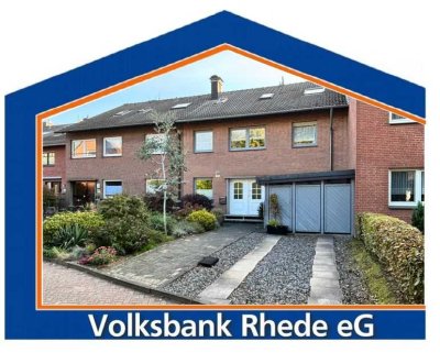 Gepflegtes Mehrfamilienhaus mit drei separaten Einheiten, Garten und Garage in Rhede
