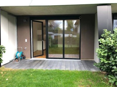 Garconniere (Wohnstudio) mit Terrasse, Garten und Tiefgaragenabstellplatz