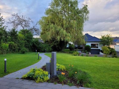 SANIERT: Massiv errichteter Bungalow mit Anbau und großem Grundstück in traumhafter Wohnlage!