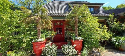 GESCHÄFTS-und WOHNHAUS mit TRAUMGARTEN DIREKT IM ORTSKERN VON OSTSTEINBEK ZU VERKAUFEN