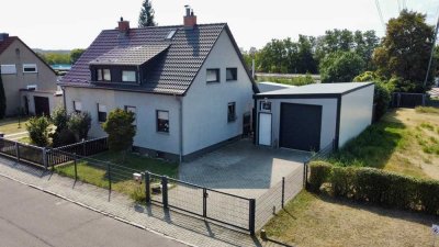 Einziehen und wohlfühlen! Moderne Doppelhaushälfte mit Garten und großer Garage zu verkaufen!
