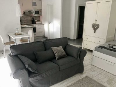 Helle, voll möblierte 1-Zimmer-Wohnung mit Balkon, TG und Aufzug im Frankfurter Bogen