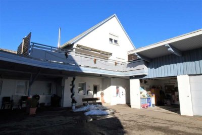 Vermietete Wohnungen mit großer Sonnenterrasse mit Weitblick und Doppelgarage