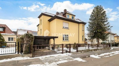 Stilvolles Zweifamilienhaus mit Vollkeller, Gartenidylle und vielseitigen Nutzungsmöglichkeiten